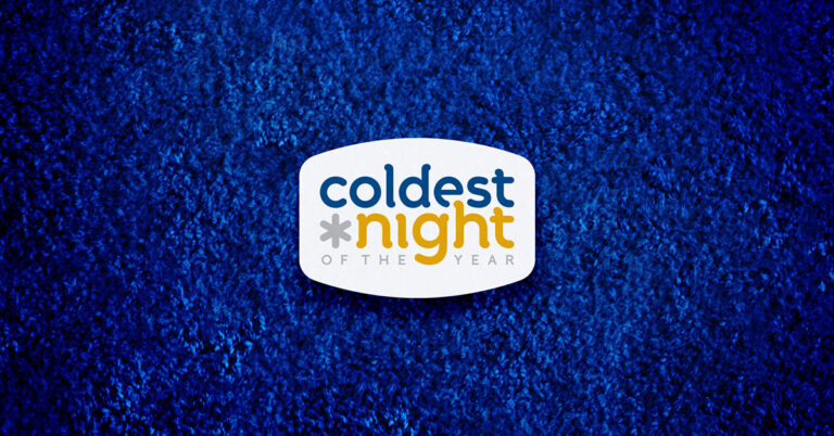 Coldest Night of the Year logo on blue textured background